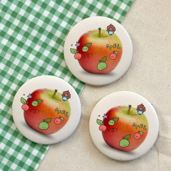 apple button badge glitter